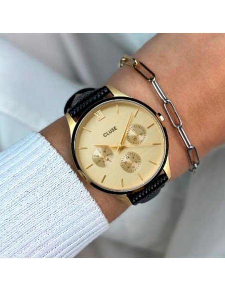 Montre Cluse Minuit pour femme : cuir noir, cadran doré, style moderne et élégant