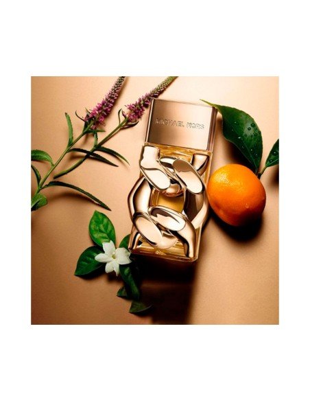 Michael Kors Woman Perfume: floral sophistication, mandarin freshness and woody sensuality
